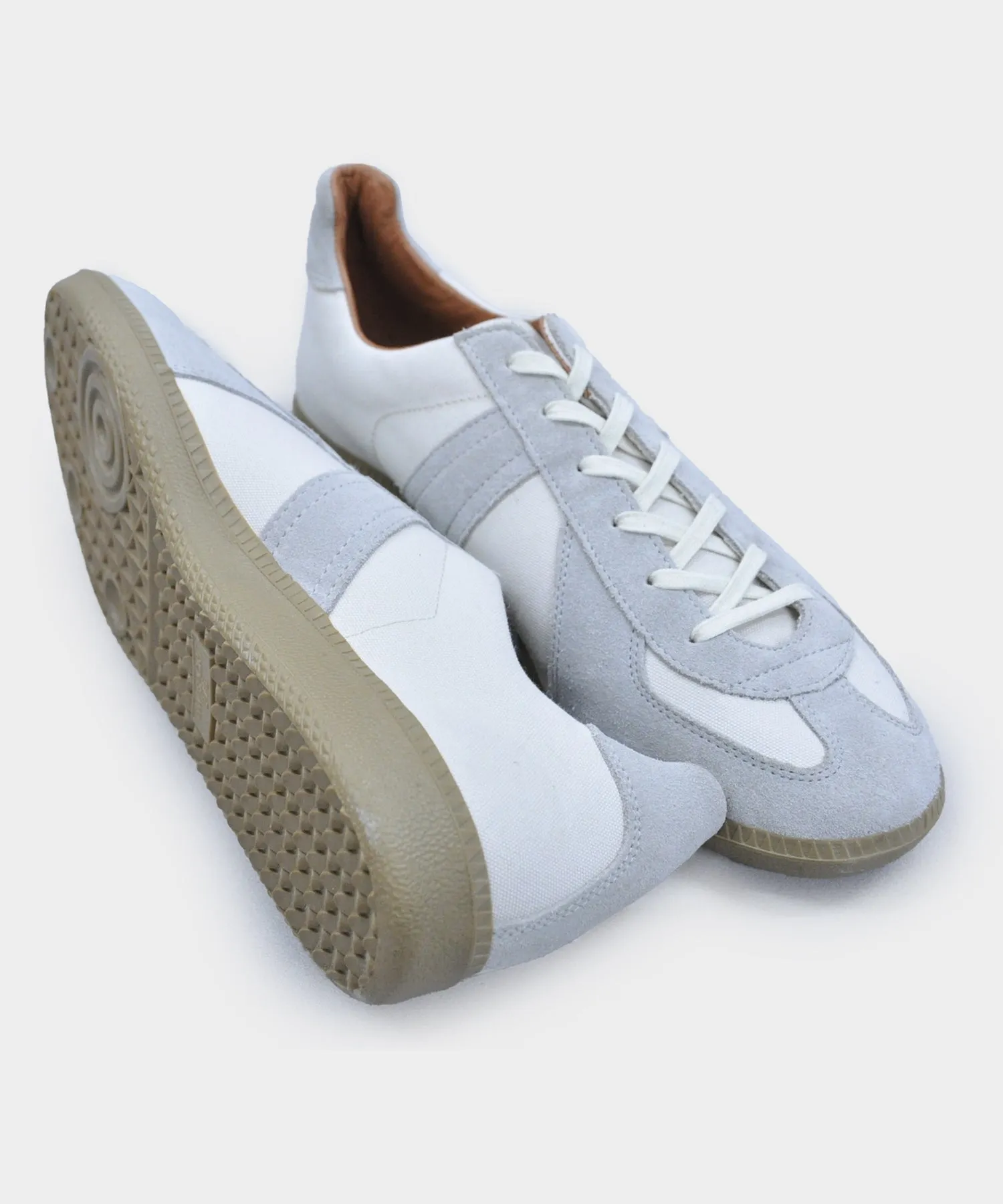 Reproduction of Found German Military Trainers in White Stone